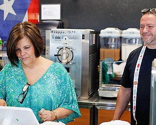 Jeanette and Carmelo Morales opened their new venture, Papa's Bakery, on McCartney Road in Campbell on Monday.