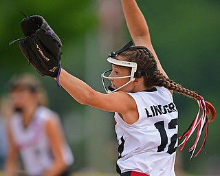 BOARDMAN, OHIO - JULY 2, 2019: Canfield's Paris Lindgren delivers in the fifth inning of their game, Tuesday night against Boardman at the Field of Dreams. Canfield won 6-1. DAVID DERMER | THE VINDICATOR