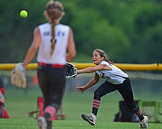 BOARDMAN, OHIO - JULY 2, 2019: Canfield's Sydney Lutz dives in an unsuccessful attempt to cath a ball hit by Boardman's Alex Ward in the fifth inning of their game, Tuesday night against Boardman at the Field of Dreams. Canfield won 6-1. DAVID DERMER | THE VINDICATOR