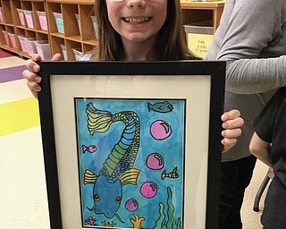 Neighbors | Submitted.Austintown Intermediate School fifth-grade student NancyRose Steele proudly displayed her artwork at the school’s first art show.