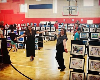 Neighbors | Submitted.Austintown Intermediate School art teachers Mrs. Sheridan and Miss Houston welcomed students and their families to the school’s first art show on May 6.