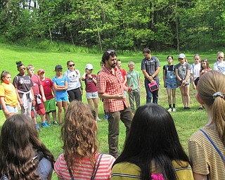 Neighbors | Jessica Harker.Josh Boyle, a natural resource and wildlife teachers aide at MCCTC, partenered with Boardman school's to create the BioBlitz program, and traveling with the school to the Lily Pond May 16.