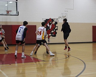 Neighbors | Abby Slanker.Canfield Village Middle School eighth-grade students played the championship game of the Reel Madness basketball tournament on May 10.