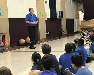 Neighbors | Jessica Harker.Motivational speaker Jim "basketball" Jones spoke to students in all grades at St. Christine's school May 24 during the school's annual Field Day.