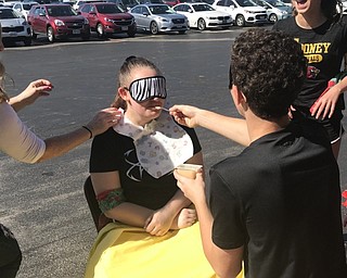 Neighbors | Jessica Harker.The youngest students in relay groups had to be fed baby food by the two oldest students May 24 during St. Christine's annual Field Day celebration.