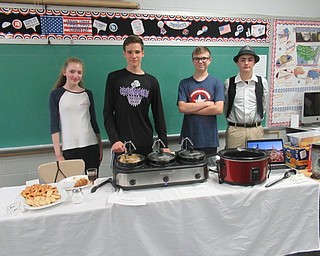 Neighbors | Jessica Harker.Students with German heritage set up a table at St. Christine's International Day celebration May 23.