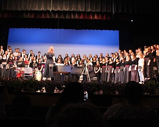 Neghbors | Abby Slanker.In keeping with tradition to end the spring concert, all Canfield High School choirs joined together on stage with alumni who were in attendance to perform “Battle Hymn of the Republic” on May 23.