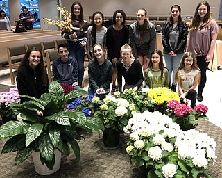 Neighbors | Submitted.Holy Family Youth Ministry members came out in force to help decorate the church for Easter.  (Front) Sydney Norris, Matthew Smith, Cassidy Smith, Riley Norris, Josie Norris, Macy Rodgers;  (Back) Gemma Kearns, Margaret Faur, Isabella Farina, Paige Brockway, Kailey Rodgers and Katelynn Roberts.