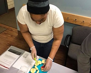 Neighbors | Submitted.Community members learned proper cooking techniques and nutrition infortmation from the Ohio State Expanded Food and Nutrition Education Program which is hosted a nine week program at the Austintown Farmers Market this summer.