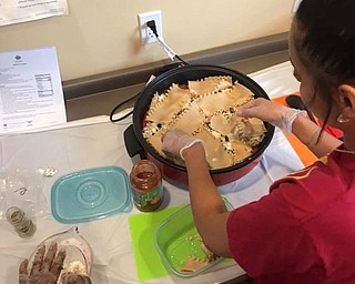 Neighbors | Submitted.The Ohio State Expanded Food and Nutrition Education Program teaches weekly recipes along with other budgeting and nutrition information at the Austintown Farmers Market.