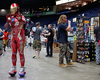 Tony Starr, of West Akron, dressed as Iron Man, poses for a photo at the Youngstown Comic Con in Covelli Centre on Saturday afternoon. EMILY MATTHEWS | THE VINDICATOR