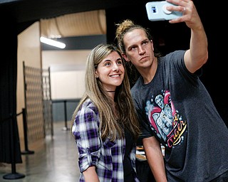Tace Zona, left, of New Castle, takes a photo with Jason Mewes at the Youngstown Comic Con in Covelli Centre on Saturday afternoon. EMILY MATTHEWS | THE VINDICATOR