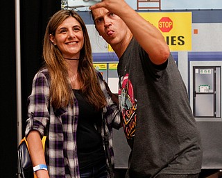 Tace Zona, left, of New Castle, takes a photo with Jason Mewes at the Youngstown Comic Con in Covelli Centre on Saturday afternoon. EMILY MATTHEWS | THE VINDICATOR