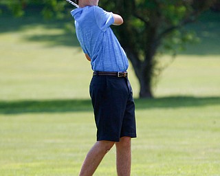 Ethan Sicafuse, 17, of Ursuline drives the ball during the Greatest Golfer junior qualifier at Salem Hills Golf Club on Tuesday. EMILY MATTHEWS | THE VINDICATOR