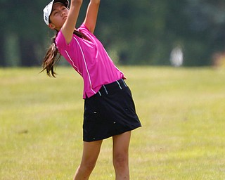 Joclyn Chow, 13, of Canfield, drives the ball during the Greatest Golfer junior qualifier at Salem Hills Golf Club on Tuesday. EMILY MATTHEWS | THE VINDICATOR