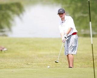 C.J. Brew, 12, of Hubbard, putts the ball during the Greatest Golfer junior qualifier at Salem Hills Golf Club on Tuesday. EMILY MATTHEWS | THE VINDICATOR