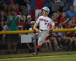Canfield's Dylan Mancini runs home after hitting a home run against Boardman during their game at Field of Dreams in Boardman on Wednesday night.