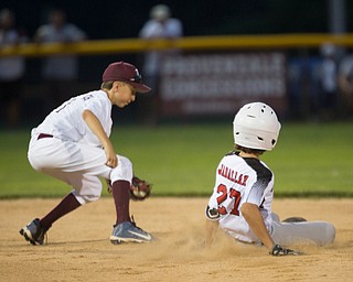 Boardman's Dom Polkovitch attempts to tag Canfield's Zain Jadallah, who made it safely to second, during their game at Field of Dreams in Boardman on Wednesday night.