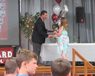 Neighbors | Jessica Harker .Rebecca Zets shook hands with and received her diploma from school principal Alphonse Cervello on May 31 at West Boulevard's fourth-grade graduation.