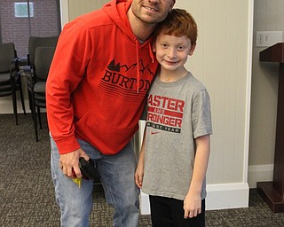 Neighbors | Abby Slanker.Aiden McFarland, of Canfield, brought his dad, Aaron, to the Canfield library's Donuts with Dad for a morning of fun and games on June 15.