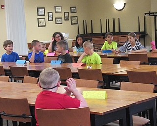 Neighbors | Jessica Harker .Children gathered at the Poland library June 24 for the first day of the library's annual Sign Language Camp.