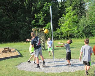 Neighbors | Jessica Harker .Children played tetherball during their free time on June 27 at the Boardman Park's Adventure Day Camp.