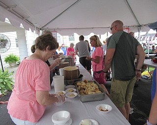 Neighbors | Jessica Harker.Community members gathered outside of Poland Presbyterian Church June 28 to enjoy dinner and the annual Strawberry Festival.