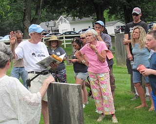 Neighbors | Jessica Harker.A member of the Poland Historical Society gave a tour of the graveyard next to Poland Presbyterian Church June 28 at Celebrate Poland.
