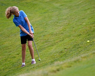 Kaitlyn Hoover, 13, of New Castle, hits the ball uphill during the Greatest Golfer junior qualifier at Tam O'Shanter Golf Course in Hermitage, Pa. on Thursday. EMILY MATTHEWS | THE VINDICATOR