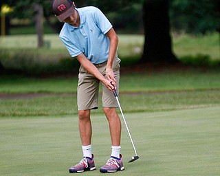 Rocco Turner, 14, of Poland, putts the ball during the Greatest Golfer junior qualifier at Tam O'Shanter Golf Course in Hermitage, Pa. on Thursday. EMILY MATTHEWS | THE VINDICATOR