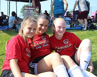 Neighbors | Abby Slanker.Members of the Canfield High School Lady Cardinals soccer team waited to play their next game at the 11th annual Cardinal Classic Soccer Tournament.