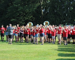 Neighbors | Abby Slanker.The Canfield High School marching band performed  “Canfield Alma Mater" during the Till Open ceremony.