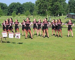 Neighbors | Abby Slanker.The Cardinal cheerleaders performed a spirit cheer for the large crowd at the Till Open ceremony prior to the start of the eighth annual golf outing on July 6.
