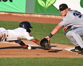 William D. Leiws The Vindicator  Scrappers Brayan Roccio(1) dives back to first as Renegades Jacson McGowan(34) waits for the throw during 71-15-19 action at Eastwood.