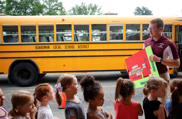 Ryan Dunn, Boardman's Transportation Supervisor, talks to incoming kindergarteners about bus safety as part of United Way's Success By 6 program at Stadium Drive Elementary on Tuesday morning. EMILY MATTHEWS | THE VINDICATOR