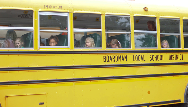 Incoming kindergarteners sit on a school bus as part of United Way's Success By 6 program's bus safety day at Stadium Drive Elementary on Tuesday morning. EMILY MATTHEWS | THE VINDICATOR