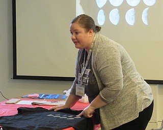 Neighbors | Jessica Harker .Amelia Dale, a librarian at the Austintown library, hosted the DIY Moon Phase tshirt event at the library June 6.