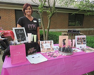 Neighbors | Jessica Harker .Mary Kay sales woman Jodi Kiko set up a stand at Beeghly Oak's Community Day June 19.