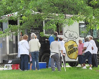 Neighbors | Jessica Harker .The Food Crusier sold food to community members and residents of Beeghly Oaks June 19 during the annual Community Day event.