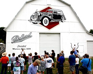 Officials dedicated a Packard automobile mural Friday morning on the barn of Don and Helen Fenstermaker on state Route 305 in Champion. It is part of the Ohio History Barn Project, which is funded with private donations and run by the Ohio History Connection.