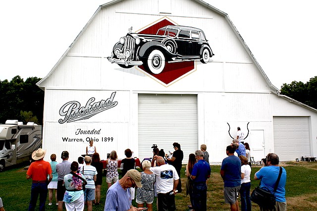 Officials dedicated a Packard automobile mural Friday morning on the barn of Don and Helen Fenstermaker on state Route 305 in Champion. It is part of the Ohio History Barn Project, which is funded with private donations and run by the Ohio History Connection.