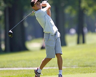 Rocco Turner drives the ball during the Greatest Golfer Boys U14 championship at Avalon Lakes on Saturday. EMILY MATTHEWS | THE VINDICATOR
