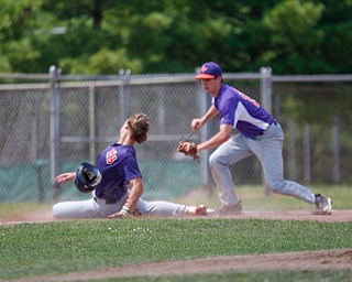 Creekside Fitness' Grant Metzger tags out New York Nines' Griffin Arnone during the NABF World Series championship game at Cene Park on Sunday. Creekside lost 5-0. EMILY MATTHEWS | THE VINDICATOR