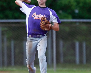 Creekside Fitness' Grant Metzger throws the ball to first during the NABF World Series championship game against the New York Nines at Cene Park on Sunday. Creekside lost 5-0. EMILY MATTHEWS | THE VINDICATOR