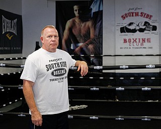 Jack Loew stands inside his South Side Boxing Club on Erie Street on Monday. EMILY MATTHEWS | THE VINDICATOR