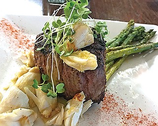 Scacchetti’s ‘filet Oscar’  is served with crab meat and asparagus and a homemade hollandaise sauce. The menu also features numerous other steak cuts, ribs, beef, lamb, chicken and seafood options.