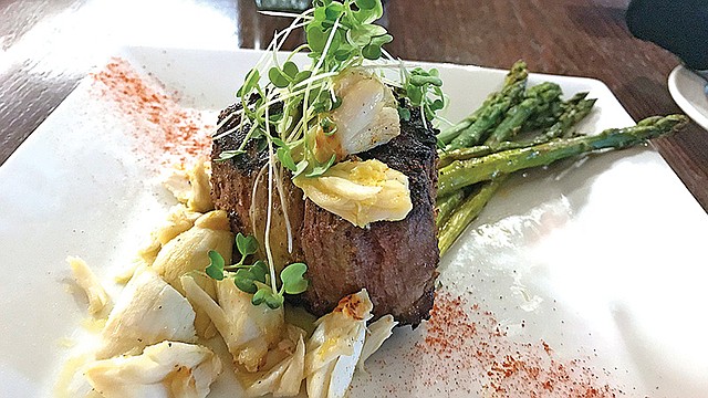 Scacchetti’s ‘filet Oscar’  is served with crab meat and asparagus and a homemade hollandaise sauce. The menu also features numerous other steak cuts, ribs, beef, lamb, chicken and seafood options.
