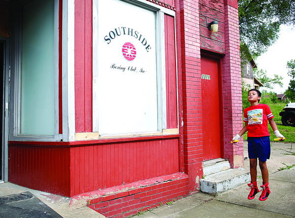 Juan Jauregui, 10, a member of Jack Loew's South Side Boxing Club, jumps rope outside the club on Erie Street on Monday. EMILY MATTHEWS | THE VINDICATOR