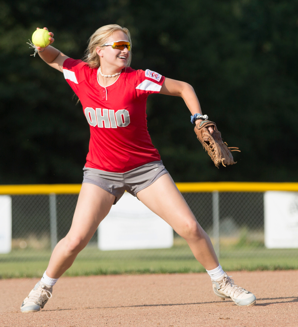 Alaina Scavina throws the ball to first as she practices with her Canfield-Poland softball team, who will be playing in the Junior League Softball World Series in Washington on Sunday. EMILY MATTHEWS | THE VINDICATOR
