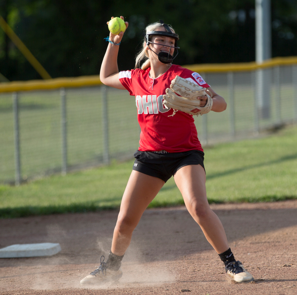 Lainey Bednar throws the ball to first as she practices with her Canfield-Poland softball team, who will be playing in the Junior League Softball World Series in Washington on Sunday. EMILY MATTHEWS | THE VINDICATOR
